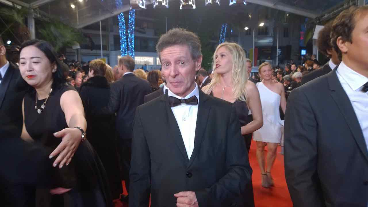 Carlos in a tuxedo at the Cannes Film Festival